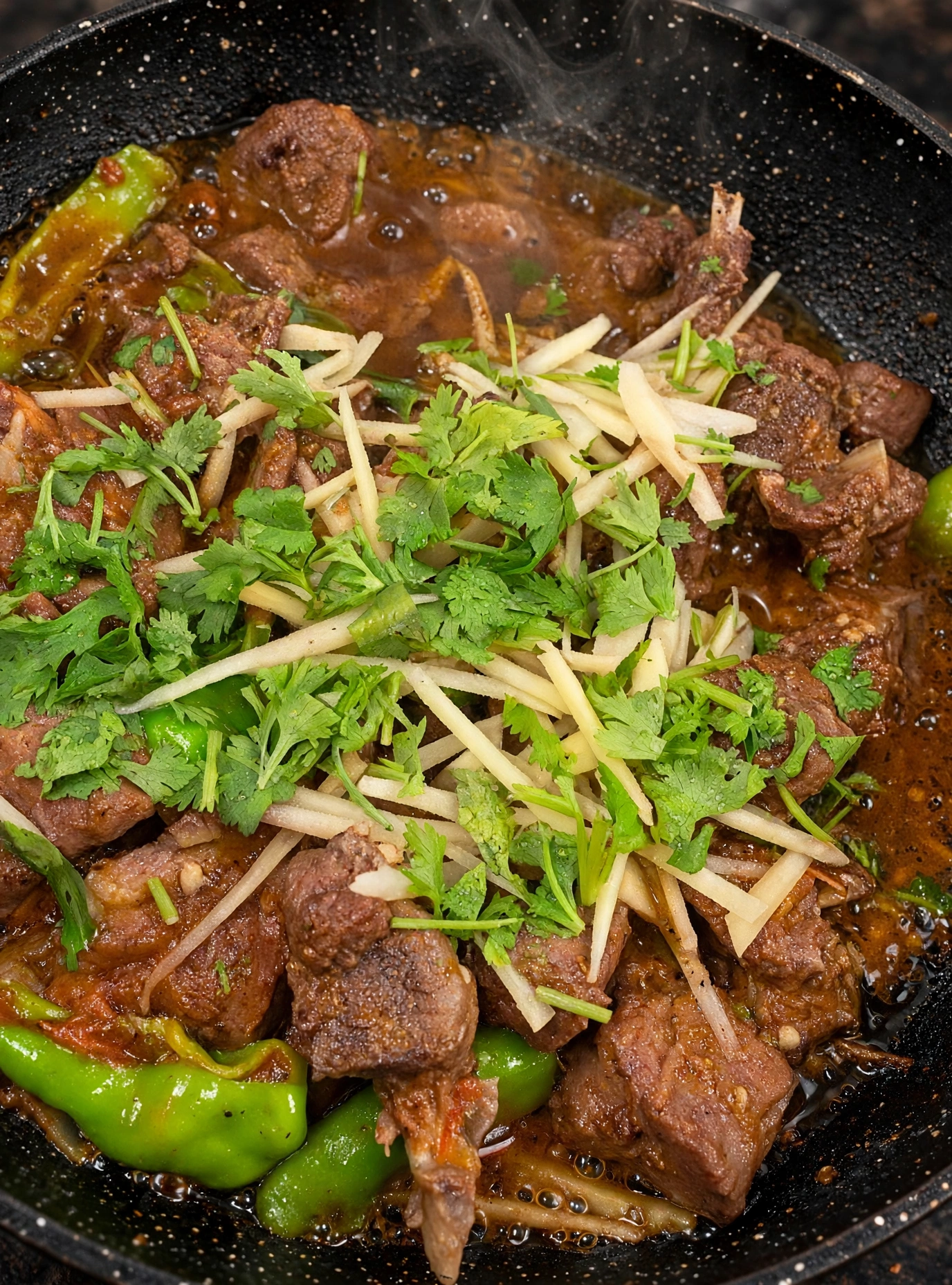 Special mutton karahi cooked live in the karahi with tomatoes, green chilli and desi ghee